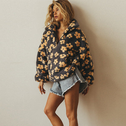 Noor | Zachte sherpa-fleece met bloemendetail