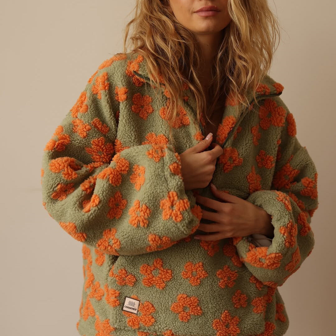 Noor | Zachte sherpa-fleece met bloemendetail