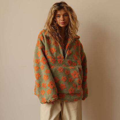 Noor | Zachte sherpa-fleece met bloemendetail