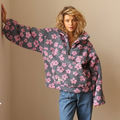 Noor | Zachte sherpa-fleece met bloemendetail