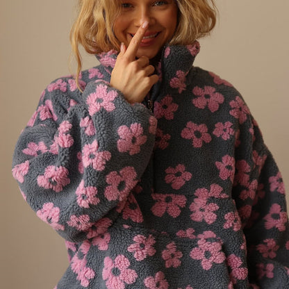 Noor | Zachte sherpa-fleece met bloemendetail